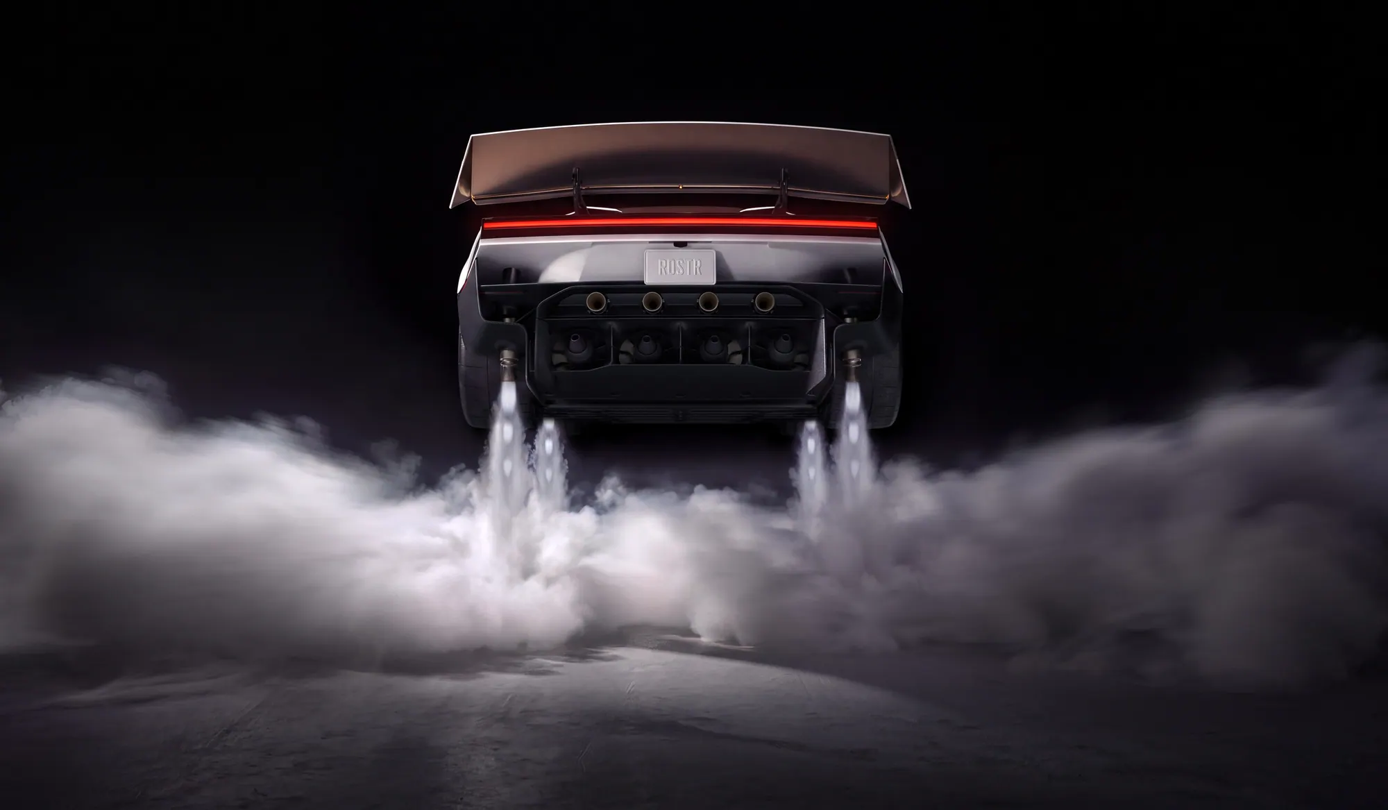 Rear view of the Roadster hovering, with the wing raised and white vapour streaming down from the nozzles. The plate reads RDSTR.